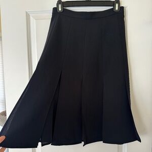 Ann Taylor flyaway pleated skirt. 0 Petite. Black